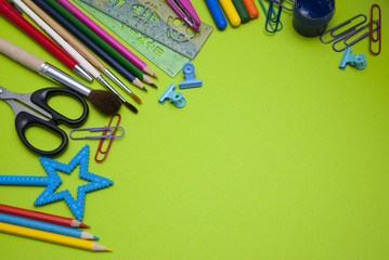 Back to School. School Supplies Green Background. Education, Studing and Education Concept.