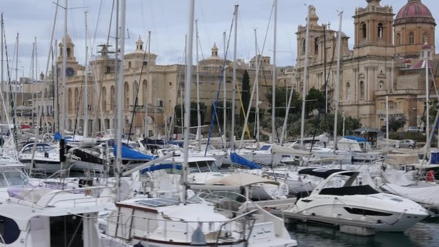 Birgu, Malta - Yachts and boats moored to the quay embankment