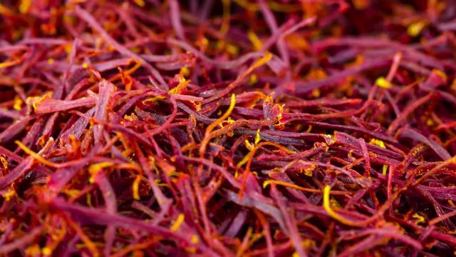 saffron threads rotation full frame close-up in motion
