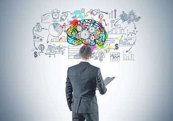 Businessman with folder, business mind, cog brain