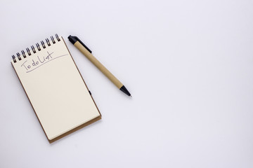 Pen and Notepad on the white background. To Do List