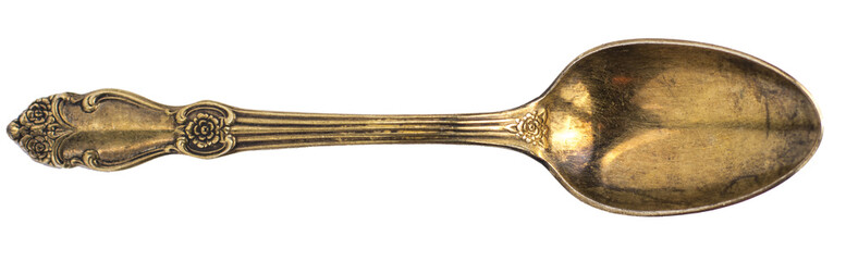 Top view of old silver tea spoon isolated on white