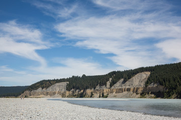 Hiking around a stone filled riverbed near Christchurch, New Zealand