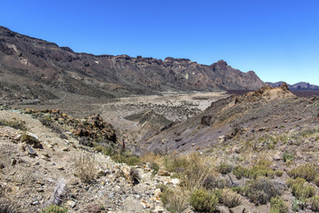 Desert in Tenerife. Lunar landscape in Tenerife national park.Volcanic mountain scenery, Teide National Park, Canary islands, Spain.Hiking in the mountains and desert