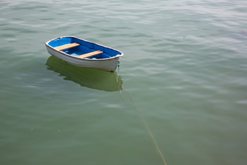 Old blue wooden skiff at Akaroa, south island New Zealand