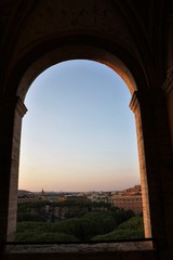 Window view to Rome at sunset, Italy 