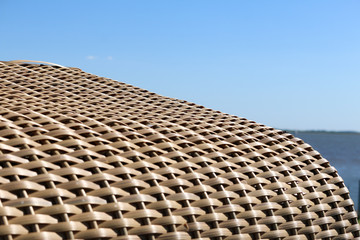 Beach chair in the meadow by the sea or Wadden Sea in summer