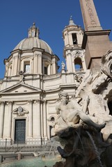 Fototapeta na wymiar Church Santa Agnese in Agone and Fontana dei Quattro Fiumi at Piazza Navona in Rome, Italy 