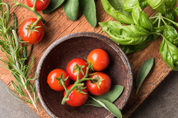 Tomatoes and Herbs in a Bowl