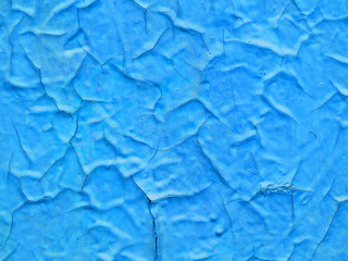Texture of old cracked blue paint, craquelure