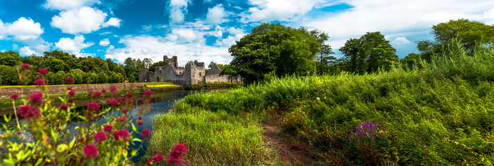 The Desmond Castle in Adare beautifull Village, on the banks of the Maigue River, in Ireland, Co. Limerick.