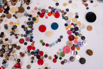 Sewing replacement buttons assorted colors smile face scattered