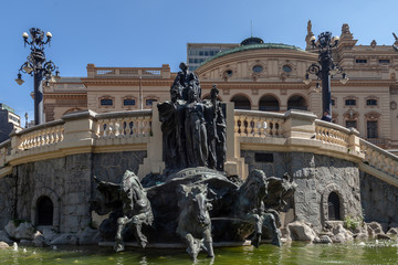 Fototapeta na wymiar Fountain view in front of city theatre