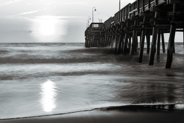 A black and white photograph of the Sandbridge Fishing Pier in Sandbridge Virginia, Virginia Beach...