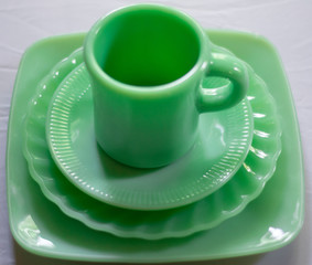 Fire King Jadeite Glass Cup, Saucers and Plate from Side Angle
