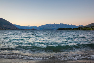 Late afternoon watching the waves at lake Wanaka, in the beautiful town of Wanaka, south island,...