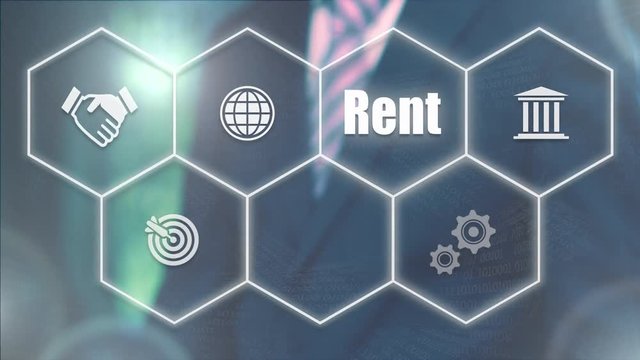 A businessman's hand selecting a Rent concept button on a futuristic computer screen.