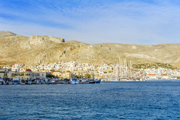 Kalymnos Island, Greece; 22 October 2010: Boats on Marina and Homes