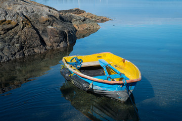 Fototapeta premium Yellow and blue fishing boat