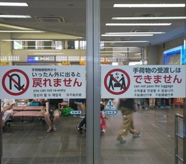 Okinawa,Japan-July 4, 2018: Warning sign displayed at Miyako airport arrival floor