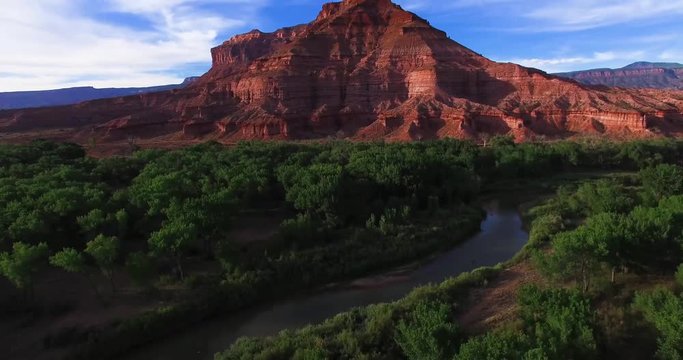 Tilt up to epic red rock sandstone formation // Drone Shot