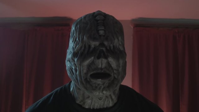 A scary, hideous monster slowly revealing itself.