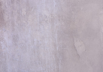 Background of a gray stucco coated and painted exterior, rough cast of cement and concrete wall texture