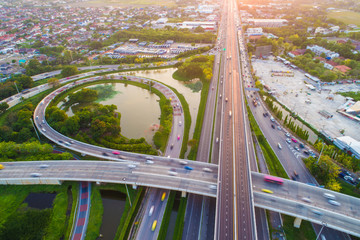 Aerial view traffic junction road with U turn lane city transport