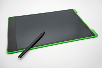 Black and green LCD writing pad tablet isolated on white