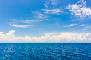 Fototapeta na wymiar Blue sky with cloud in sea background