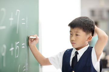 confuse schoolboy try to answer question