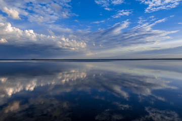 Fototapeta premium clouds reflected in the mirror of the lake