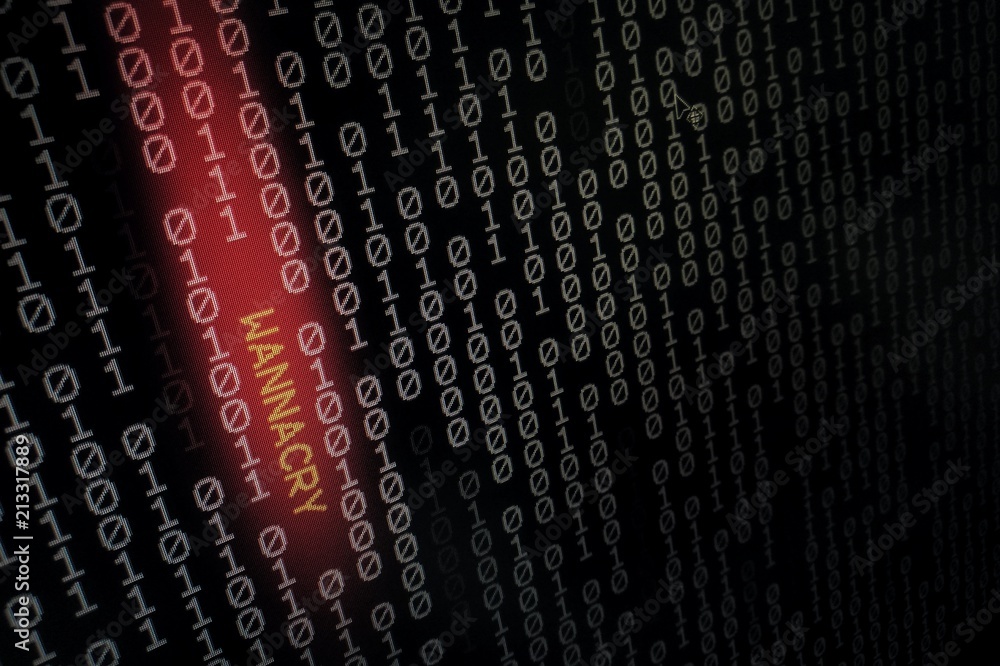 Poster computer virus. binary data shown on black screen with wannacry text hilight with red colour.