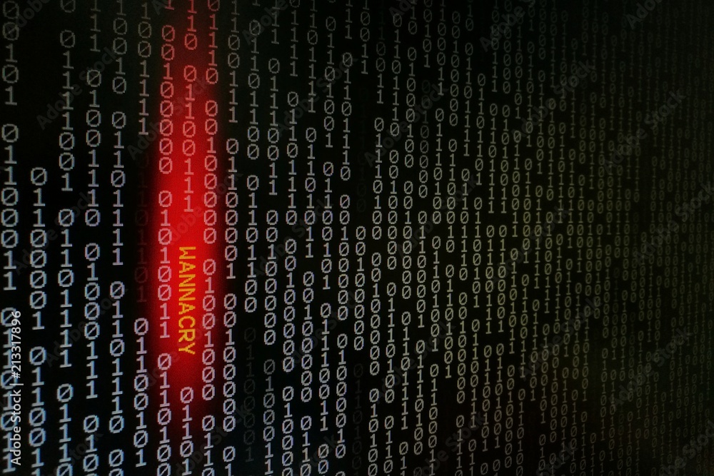 Fototapete computer virus. binary data shown on black screen with wannacry text hilight with red colour.