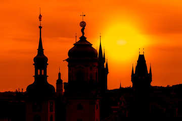 Naklejka premium czech republic, prague - spires of the old town and tyn church at sunrise