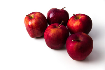 Red apple on white vibrance