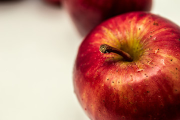 Red apple with white copy space