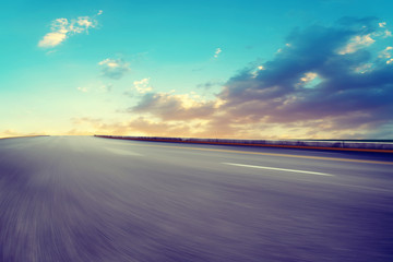 Empty highway asphalt road and beautiful sky landscape