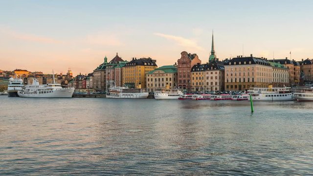 Day to Night time lapse video of Stockholm Gamla Stan with Lilla Vartan strait in Sweden timelapse 4K