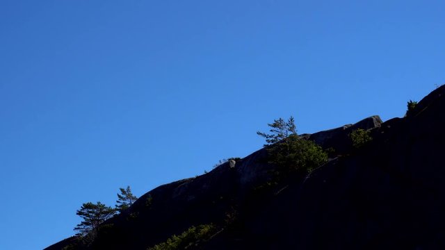 Plane flying to airport over north sea beach in Kjerringvik Norway