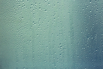 texture of a drop of rain on a glass wet transparent background