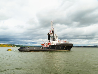 Tug boat in the Firth of Forth. Scotland, UK