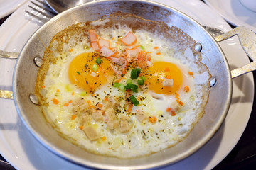 Typical breakfast with fried egg or pan omelet and fried pork,Thai food.