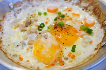 Typical breakfast with fried egg or pan omelet and fried pork,Thai food.