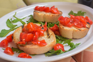 A plate of bruschetta served at a restaurant in Naples, Italy in May.