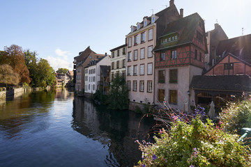 Fototapeta na wymiar Scenic old houses along the canals of Strasbourg, France