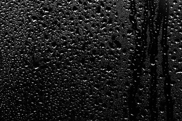 texture of a drop of rain on a glass wet transparent background