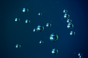 air bubbles in water macro background / blue background abstract bubbles in water