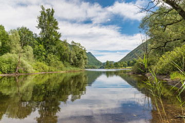 Beautiful natural Italian lake. Lake Ghirla, near the most known and big lakes Maggiore and Lugano in the province of Varese, not far from Milan. Frequented in the summer for the fresh climate