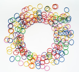 Teamwork concept. group of colorful rubber band on white background with copy space